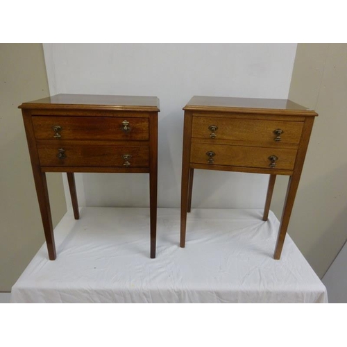 279 - A pair of neat sized mahogany bedside/lamp tables fitted with two drawers and raised on square legs.