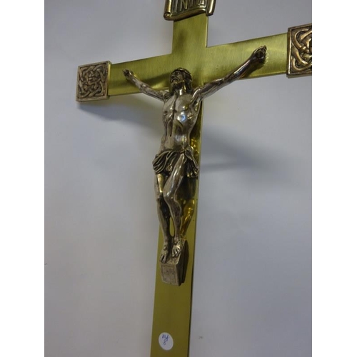 282 - Tall brass crucifix on stand. H. 130cm approx.