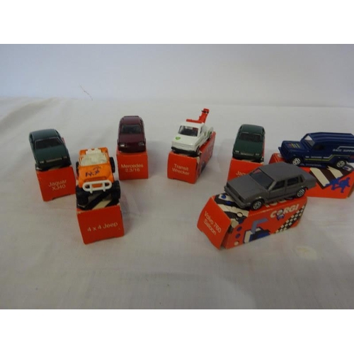 283 - Seven Corgi cars, (1985).