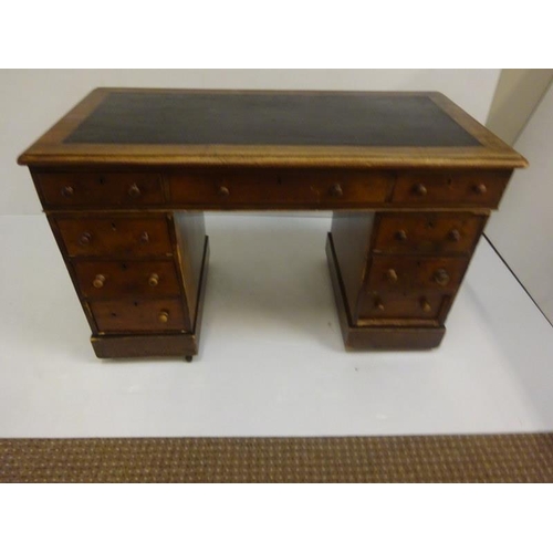 287 - Victorian mahogany pedestal desk fitted with nine drawers. 122cm x 60cm approx.