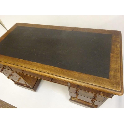 287 - Victorian mahogany pedestal desk fitted with nine drawers. 122cm x 60cm approx.