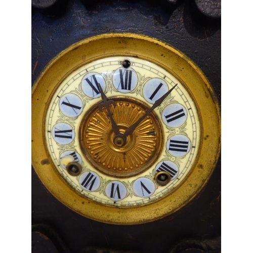 3 - Stained wood mantel clock. Ansonia Clock Co., New York.