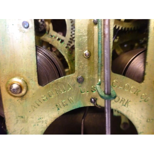 3 - Stained wood mantel clock. Ansonia Clock Co., New York.