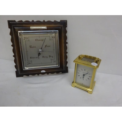 313 - Oak cased Aneroid barometer and a French brass carriage clock.