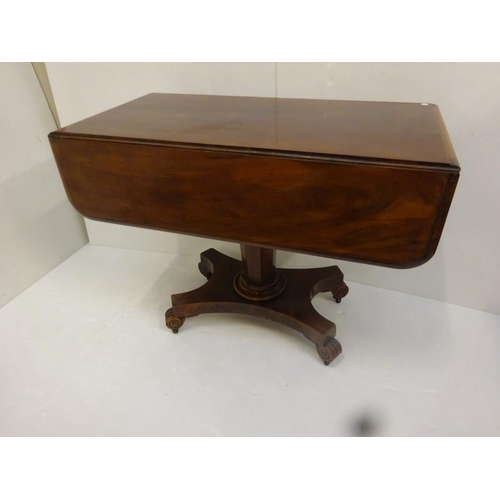 334 - 19th century mahogany drop leaf table fitted with a drawer raised on centre support and platform bas... 