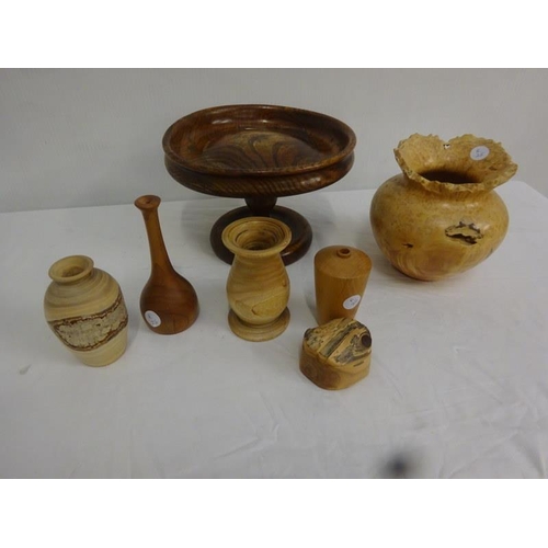 345 - Carved wood vessels and comport. (7)