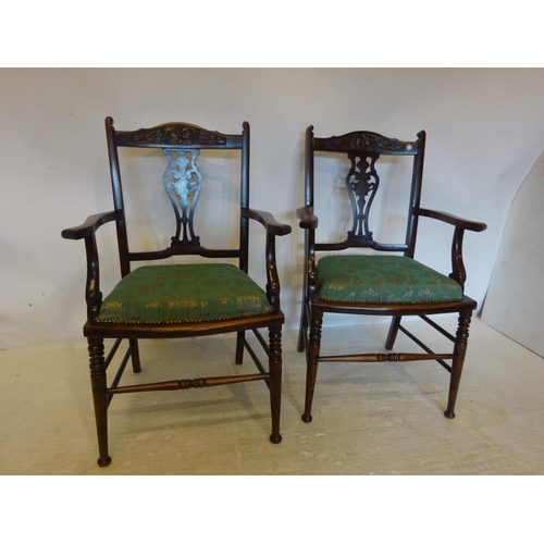 45 - A pair of Edwardian mahogany open armchairs.