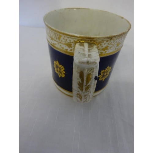 49 - A Bloor Derby china mug having gilded decoration and a scene of part of Gloucester. (hairline crack ... 