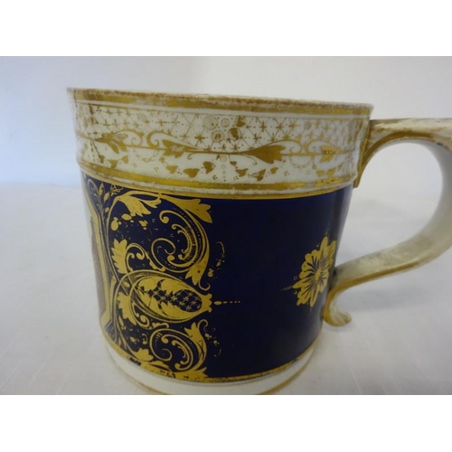 49 - A Bloor Derby china mug having gilded decoration and a scene of part of Gloucester. (hairline crack ... 