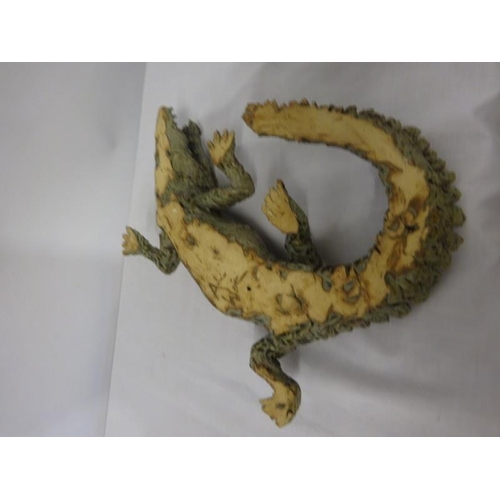 51 - Pottery sculpture of a crocodile, signed underneath.