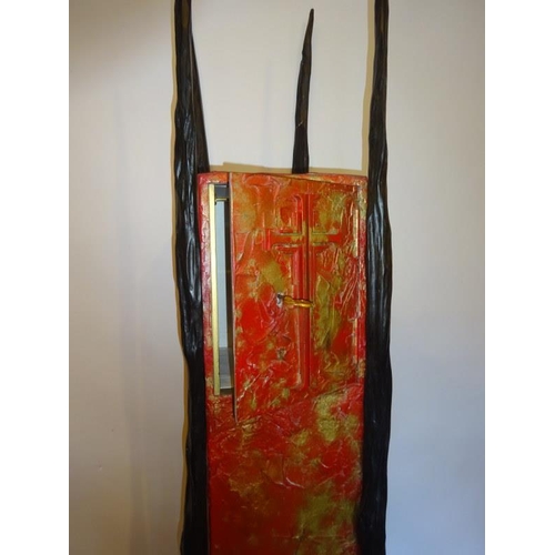 62 - Tall slim tabernacle decorated with bog oak and complete with key. Overall height 225cm approx.