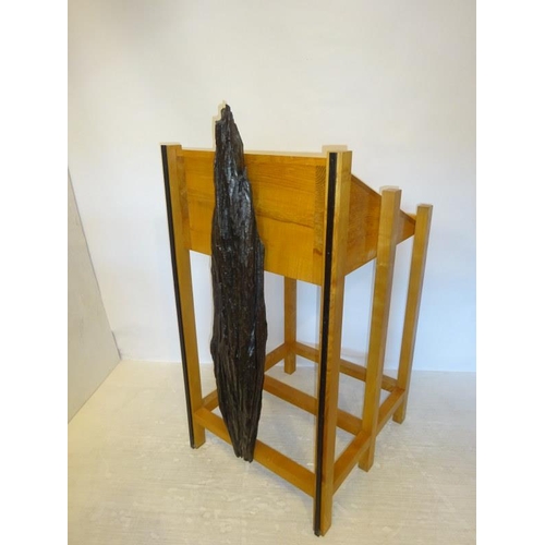 63 - A timber framed lectern and chair with bog oak decoration. H. 132cm D. 78cm.  W. 70cm approx.