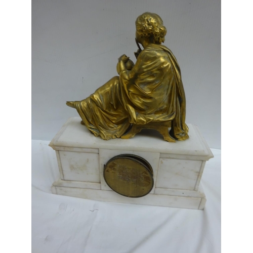 89 - Victorian marble mantle clock surmounted with a brass figure with a seated lady with globe.