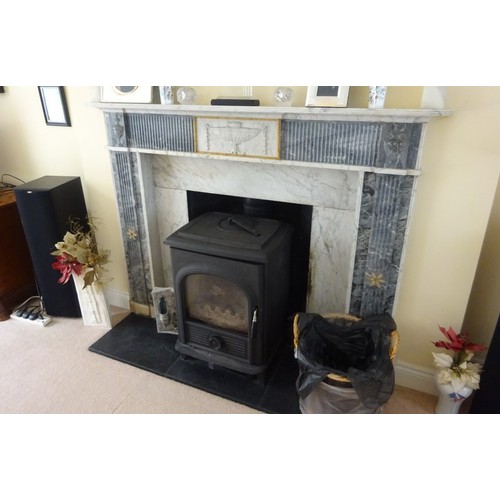 230 - A good Irish Georgian marble fireplace having Adams urn centre plaque, fluted columns with smaller u... 