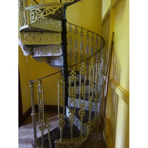 300 - A good Victorian cast iron spiral staircase, H. 16ft, Width 2ft approx, in good overall condition. P... 