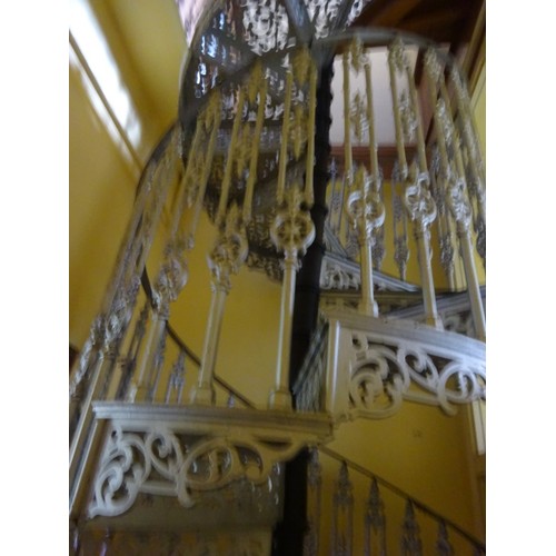 300 - A good Victorian cast iron spiral staircase, H. 16ft, Width 2ft approx, in good overall condition. P... 