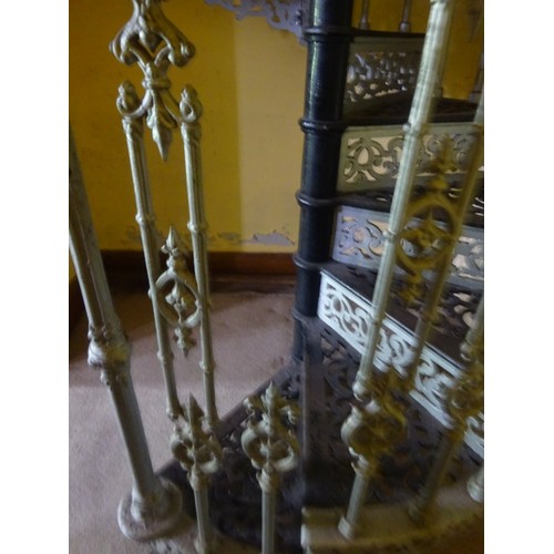 300 - A good Victorian cast iron spiral staircase, H. 16ft, Width 2ft approx, in good overall condition. P... 