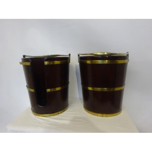 1 - A pair of Irish Georgian mahogany and brass banded peat and plate buckets. H. 43cm, D. 36cm approx. ... 