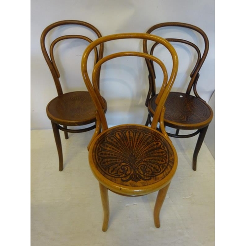 10 - Three bendwood chairs.