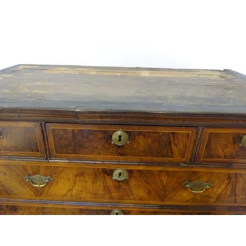 102 - A good 18th century walnut chest on legs, the upper section fitted with three short and three long d... 