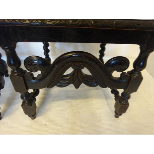 103 - Pair of antique carved oak hall chairs having shaped high backs with barley twist columns. Overall h... 