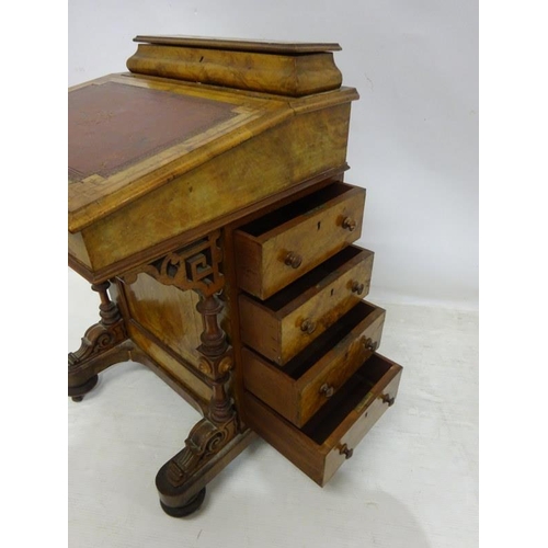 105 - A good original Victorian walnut davenport desk having birds eye maple interior and fitted with real... 