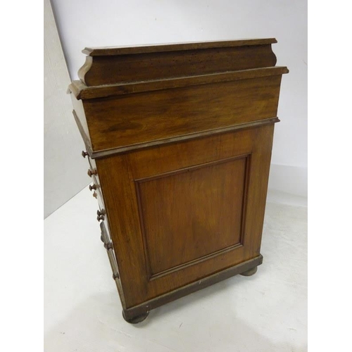 105 - A good original Victorian walnut davenport desk having birds eye maple interior and fitted with real... 