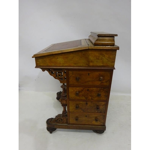 105 - A good original Victorian walnut davenport desk having birds eye maple interior and fitted with real... 