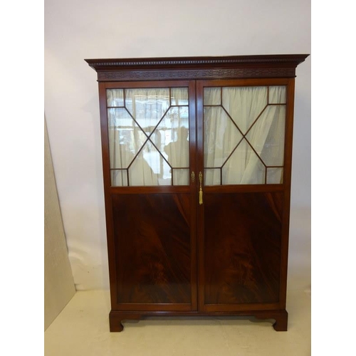 108 - Fine antique mahogany two door wardrobe, the cornice with dentil freize and blind fret decoration ov... 