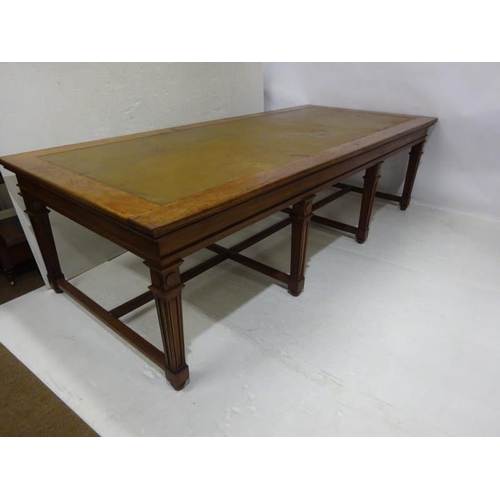 110 - A good antique oak library table, the rectangular top raised on 8 tapering legs with cross stretcher... 