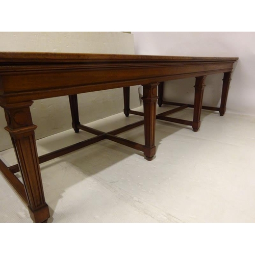 110 - A good antique oak library table, the rectangular top raised on 8 tapering legs with cross stretcher... 