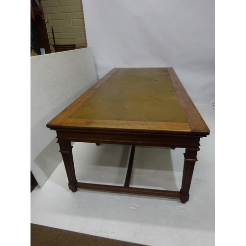 110 - A good antique oak library table, the rectangular top raised on 8 tapering legs with cross stretcher... 