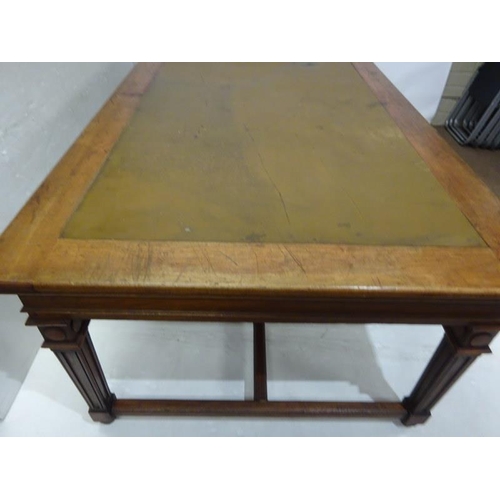 110 - A good antique oak library table, the rectangular top raised on 8 tapering legs with cross stretcher... 