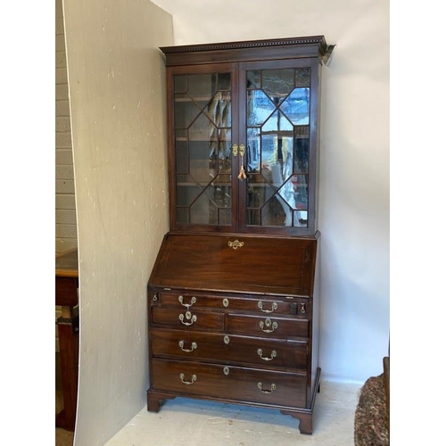 120 - Georgian mahogany bureau bookcase, the upper section with dentil cornice and section glass doors, th... 