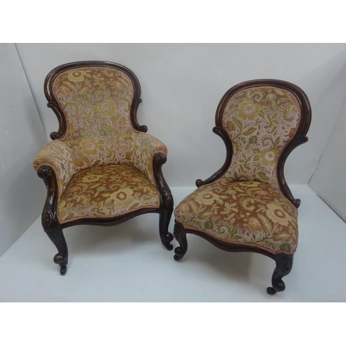 126 - Victorian mahogany ladies and gents drawing room chairs raised on cabriole legs.