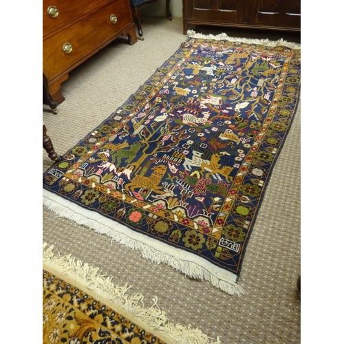 133 - Afghan animal patterned rug. 200cm x 110cm approx.