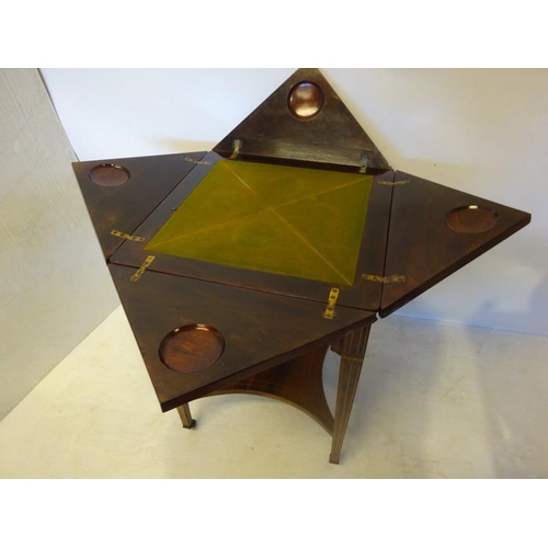 151 - Late 19th century inlaid rosewood envelope card table fitted with a drawer and raised on four taperi... 