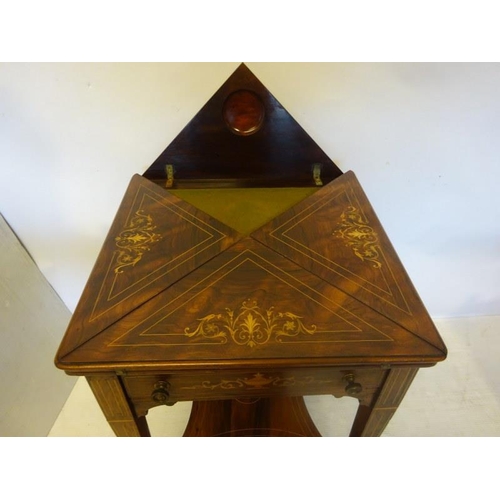 151 - Late 19th century inlaid rosewood envelope card table fitted with a drawer and raised on four taperi... 