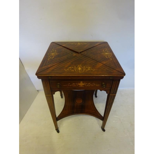 151 - Late 19th century inlaid rosewood envelope card table fitted with a drawer and raised on four taperi... 