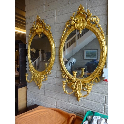 152 - A pair of Victorian gilt and gesso girandole mirrors. H. 120cm, W. 60cm approx.