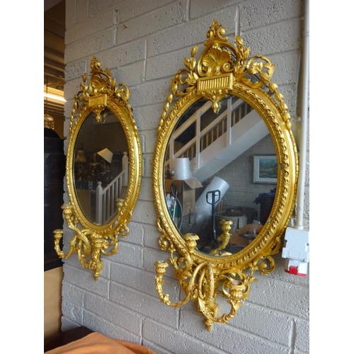 152 - A pair of Victorian gilt and gesso girandole mirrors. H. 120cm, W. 60cm approx.