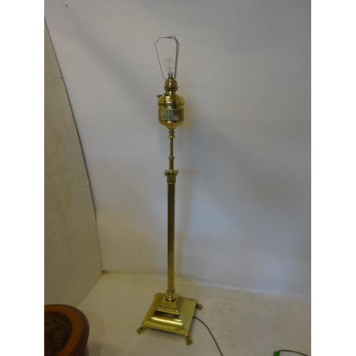 157 - Antique brass adjustable oil lamp electified with shade.