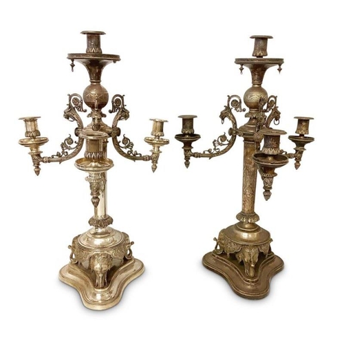 216 - Pair of large antique silver plated candleabra, the scroll arms decorated with animals on turned tap... 