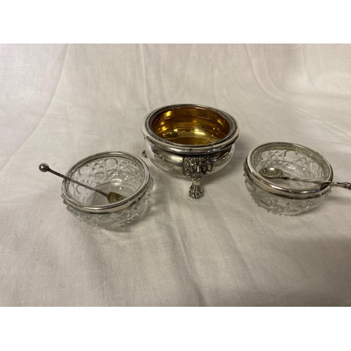 221 - A pair of Birmingham silver sauces, 1902 and a large plated and gilded bowl on lions feet.