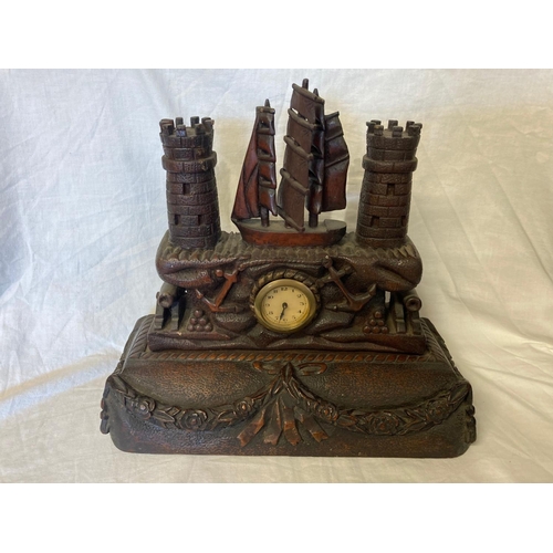 223 - Cork School of Carving - An interesting late 19th century oak mantle clock, the top section carved w... 