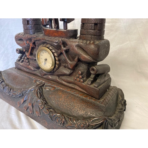 223 - Cork School of Carving - An interesting late 19th century oak mantle clock, the top section carved w... 