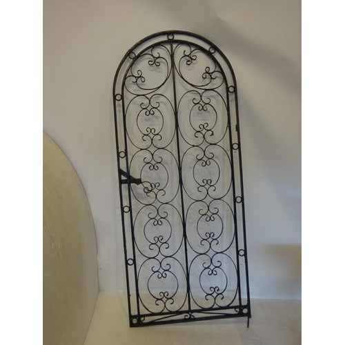 242 - Large decorative arched top wrought iron gate. H. 220cm approx.