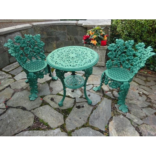 250 - A pair of good cast iron garden chairs from a design by Charles D. Young, Edinburgh together with a ... 