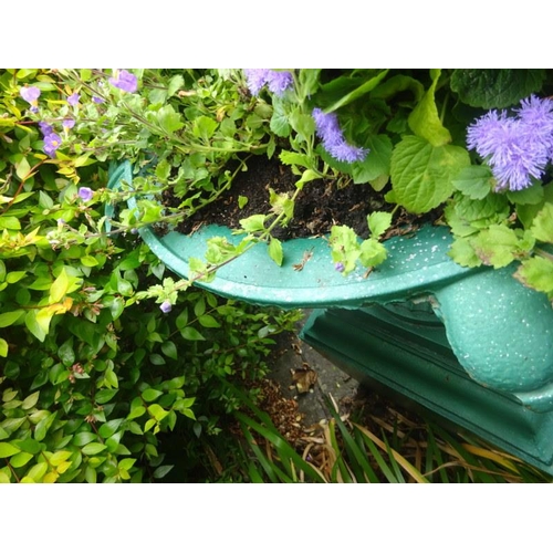 263 - Cast iron garden urn on large pedestal, piece of rim missing. H. 90cm approx.