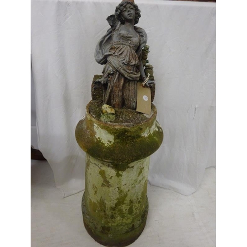 270 - Old pottery chimney pot with figure.